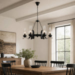 Afbeelding laden in galerijweergave, Six-light hurricane glass chandelier in a bright dining room