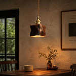 Cargar imagen en el visor de la Galería, Brown pendant glowing above table scene