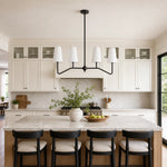 Load image into Gallery viewer, Strellux black linear chandelier above a kitchen island