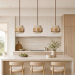 Załaduj obraz do przeglądarki galerii, Three light travertine pendant above a bright kitchen island