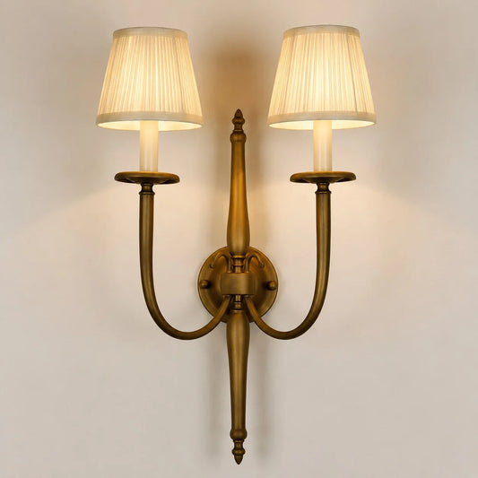 Front view of double arm wall sconce with pleated fabric shades