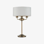 Afbeelding laden in galerijweergave, Tela 1‑licht en 3‑licht tafellamp – modern linnen en metaal voor nachtkastje of woonkamer