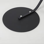 Cargar imagen en el visor de la galería, Lámpara de pie curva minimalista Lirra – Acento metálico elegante para espacios de estar