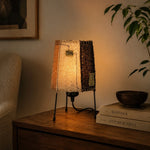 Cargar imagen en el visor de la Galería, Natural woven fiber table lamp glowing on nightstand
