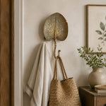Afbeelding laden in galerijweergave, Antique-gold botanical wall hook in an entryway