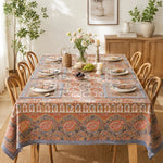 Załaduj obraz do przeglądarki galerii, Charcoal paisley floral tablecloth styled in a warm dining room