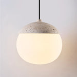 Cargar imagen en el visor de la Galería, Lit shade detail showing warm bulb glow through the pendant form