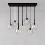 Load image into Gallery viewer, Lumivelle Sculptural 7-Light Chandelier – Adjustable Height Modern Glass Pendant