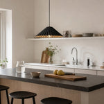 Cargar imagen en el visor de la Galería, Black metal dome pendant lamp above a kitchen island