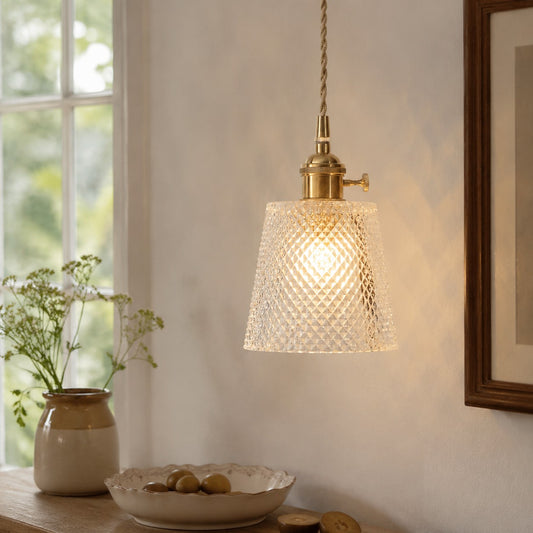 Style A diamond-textured glass pendant beside a sunlit dining table