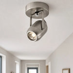 Cargar imagen en el visor de la Galería, Adjustable wall lamp adding warm accent light near an entryway