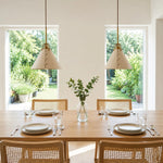 Cargar imagen en el visor de la Galería, Leather pendant lights over a bright dining table