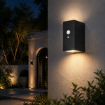 Załaduj obraz do przeglądarki galerii, Style C outdoor wall lamp casting light on a garden entry wall