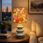 Bild in die Galerieansicht laden, Floral fabric shade ceramic table lamp on a console table