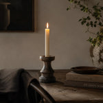 Afbeelding laden in galerijweergave, Solid wood candle holder with a taper candle in a dining setting; candle not included