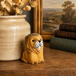 Załaduj obraz do przeglądarki galerii, Wooden lion figurine with books and vase
