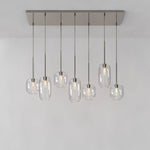 Load image into Gallery viewer, Lumivelle Sculptural 7-Light Chandelier – Adjustable Height Modern Glass Pendant