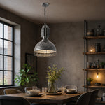 Cargar imagen en el visor de la Galería, Aged silver cage pendant light in a loft dining room
