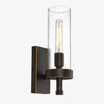 Cargar imagen en el visor de la Galería, Seeded clear glass cylinder wall sconce with black finish