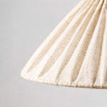Load image into Gallery viewer, Close-up of natural linen weave, stitched pleats and finished shade edge