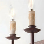 Bild in die Galerieansicht laden, Close detail of the candle style sleeves and warm flame shaped bulbs