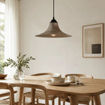 Bild in die Galerieansicht laden, Aged black iron pendant lamp over a dining table