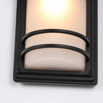 Załaduj obraz do przeglądarki galerii, Close-up of glowing glass shade and black protective bars