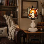 Cargar imagen en el visor de la Galería, Orange yellow cat lamp styled beside a leather chair and books