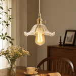 Charger l'image dans la visionneuse de la galerie, Style N flower-edged clear glass pendant above a dining table