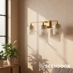 Cargar imagen en el visor de la Galería, Lámpara de pared de tocador Eliot Modern de 3 luces con cilindro de vidrio acanalado