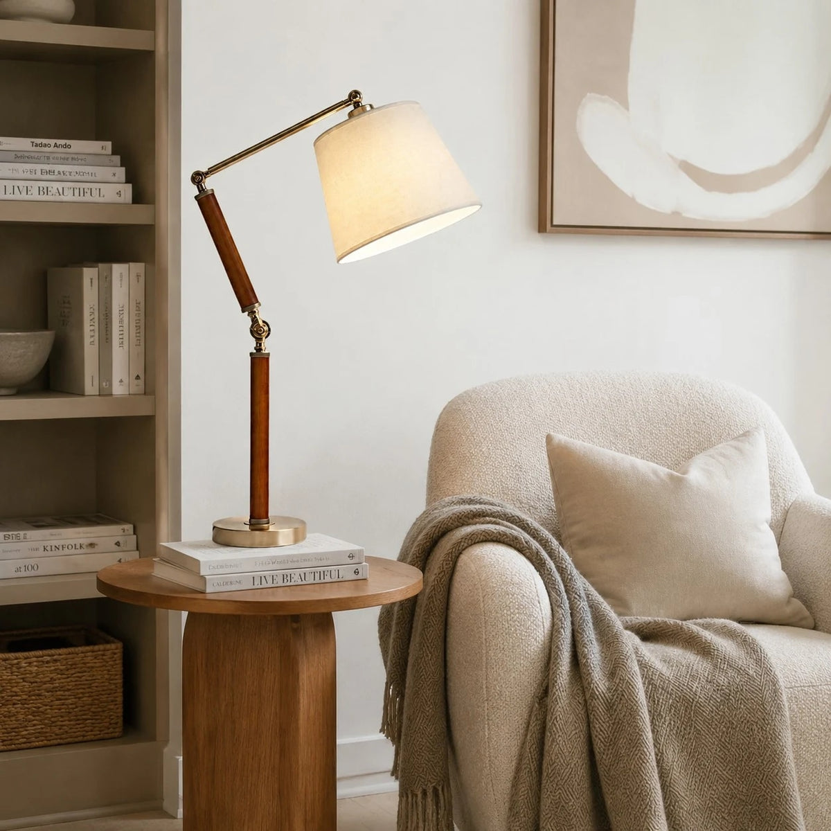 Adjustable wooden table lamp on a side table beside an armchair