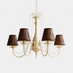 Load image into Gallery viewer, Front view of French five-light chandelier with brown fabric shades and crystal bead swags
