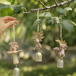 Afbeelding laden in galerijweergave, Three warm ivory woodland wind chime styles hanging on a branch