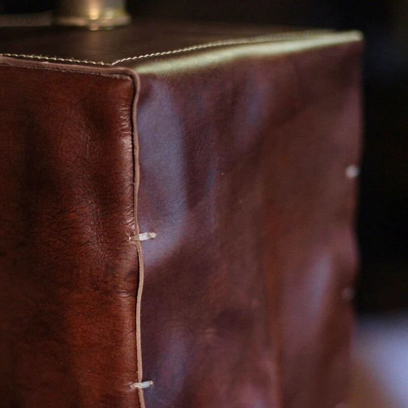 Brown leather stitched edge detail