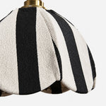 Cargar imagen en el visor de la Galería, Close-up of black and ivory striped textured fabric shade with scalloped petal shape