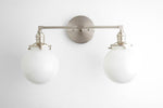 Load image into Gallery viewer, Lumio Globe Glass Globe Vanity Light - Modern Two Light Bathroom Sconce
