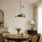 Cargar imagen en el visor de la Galería, Adjustable chrome pendant light installed over a round dining table