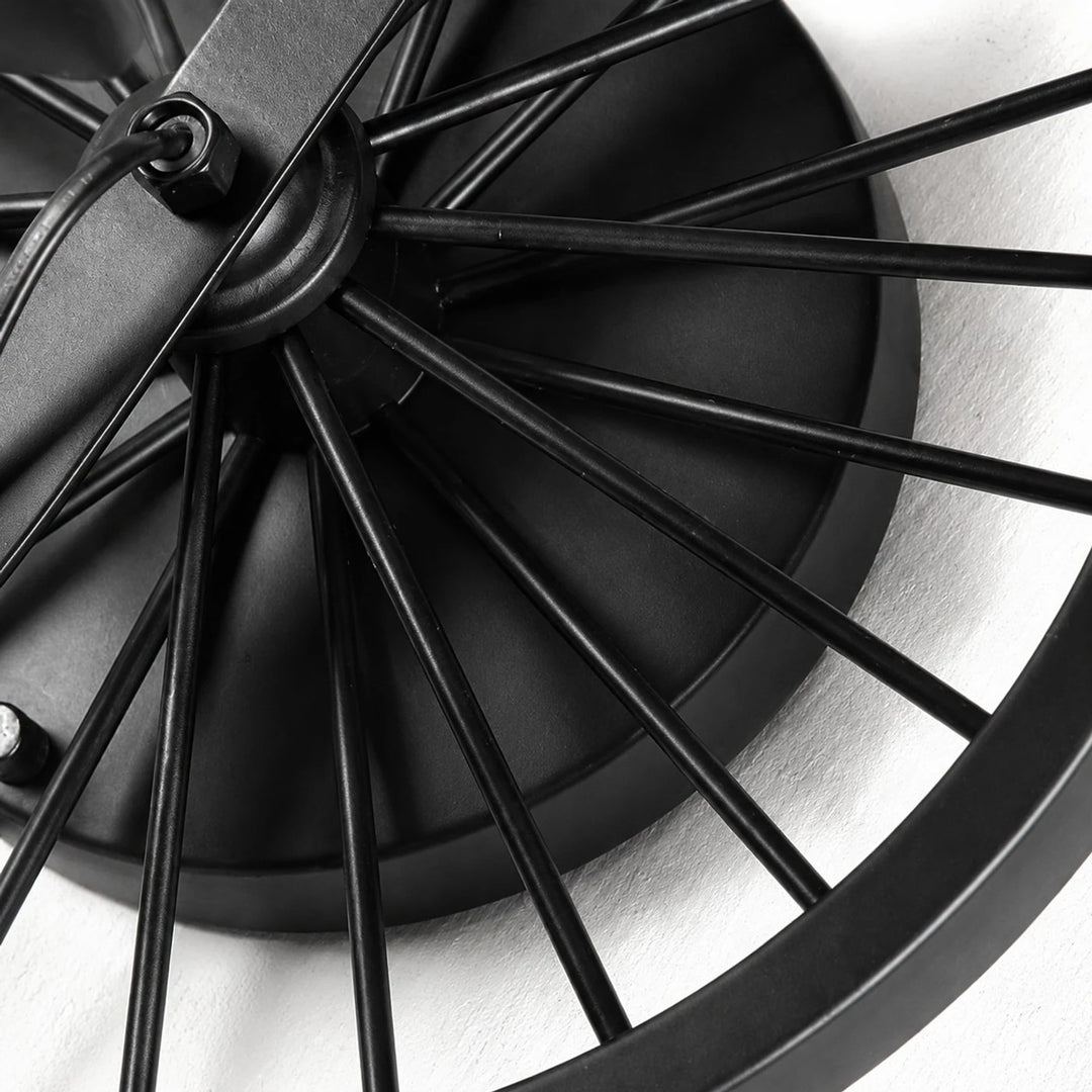 Close view of the black wagon wheel backplate and spoke detail
