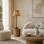 Bild in die Galerieansicht laden, Rattan table lamp in a light natural living room