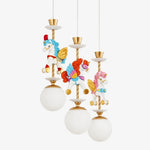 Cargar imagen en el visor de la Galería, Three light unicorn chandelier with blue and red horse details