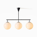 Load image into Gallery viewer, Ulvara Chandelie Linear Cluster Glass Globe Design - Contemporary Elegance
