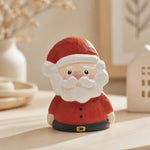 Bild in die Galerieansicht laden, Wooden Santa ornament styled on a holiday tabletop