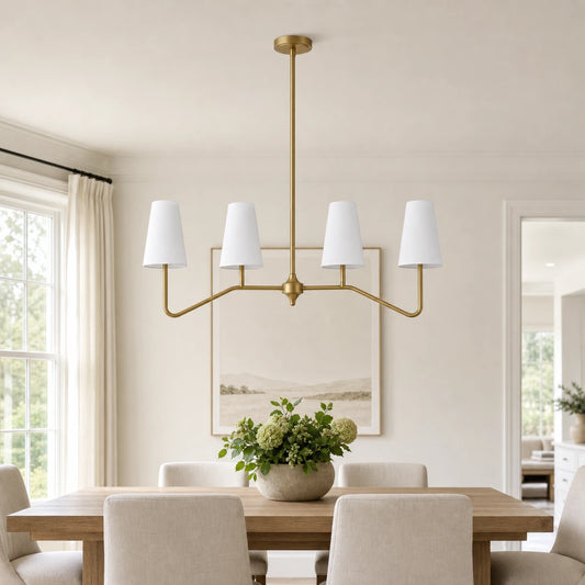 Strellux brass linear chandelier in a dining room setting