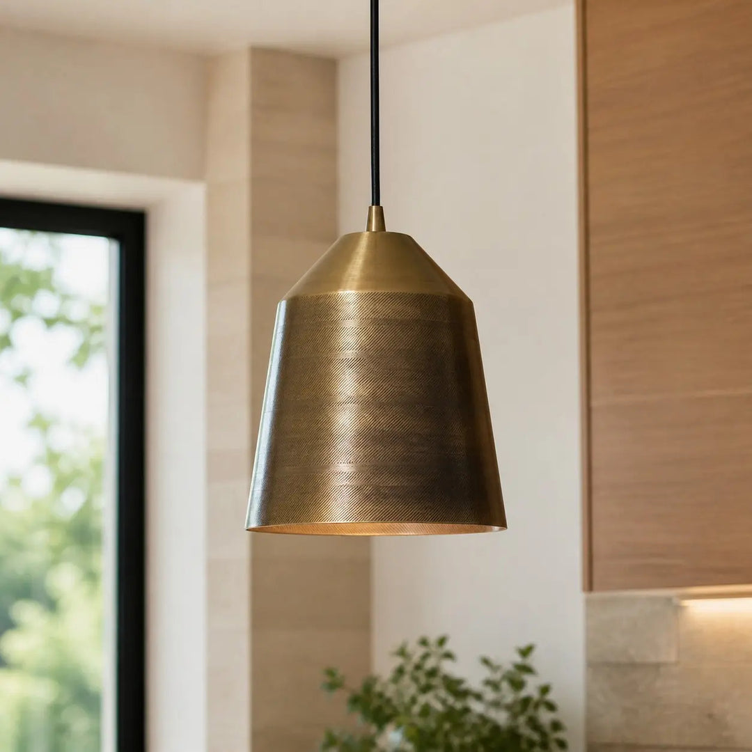 Hand-carved brass pendant lighting in an interior