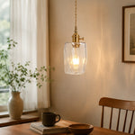Charger l'image dans la visionneuse de la galerie, Style X open-frame clear glass pendant in a warm interior corner