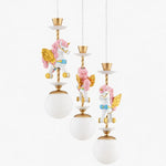 Cargar imagen en el visor de la Galería, Three light pastel unicorn chandelier with floral accents