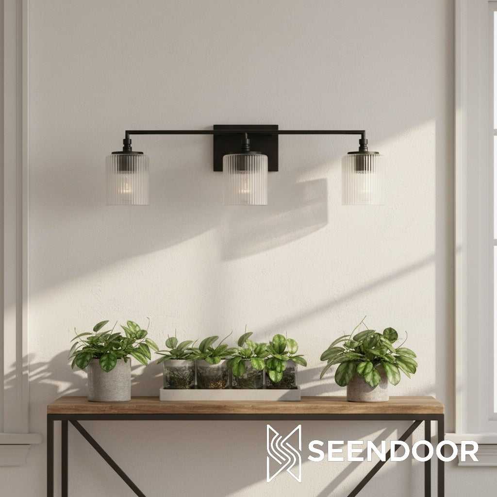 Lámpara de pared de tocador Eliot Modern de 3 luces con cilindro de vidrio acanalado