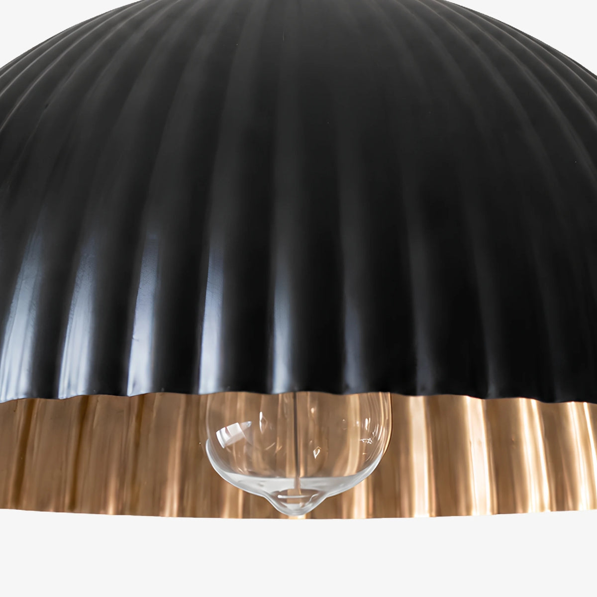 Gold interior and ribbed black metal shade detail