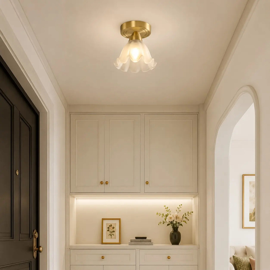 Compact floral ceiling light illuminating a hallway