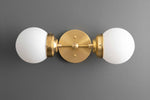 Load image into Gallery viewer, Lumio Globe Modern Geometric Sconce - Two Light Bathroom Vanity Lighting
